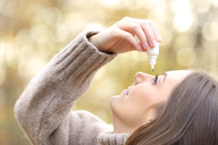 Close,Up,Of,A,Woman,With,Dry,Eyes,Applying,Artificial