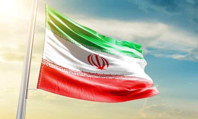 Iran,National,Flag,Waving,In,Beautiful,Sky.