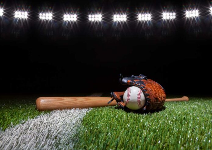 Baseball,Batt,Glove,And,Ball,Low,Angle,On,Grass,Field