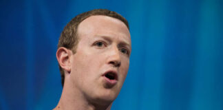 A man speaking passionately at a technology conference