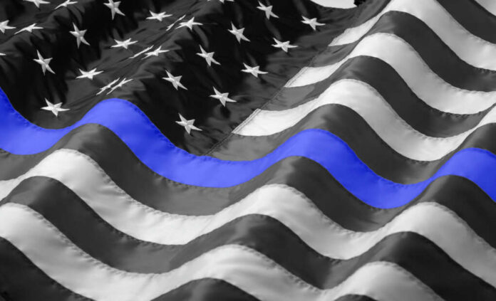 American flag with a blue line, symbolizing support for law enforcement