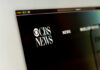Close-up of CBS News website logo on a computer screen