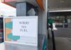 Sign at a gas station indicating no fuel available