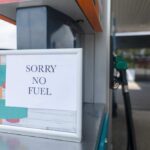Sign at a gas station indicating no fuel available