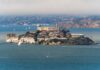 View of Alcatraz Island with sailboats in the foreground