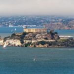 View of Alcatraz Island with sailboats in the foreground