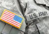Close-up of a U.S. Army uniform with an American flag patch