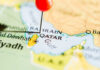 Map of Qatar with a red pin marking the location