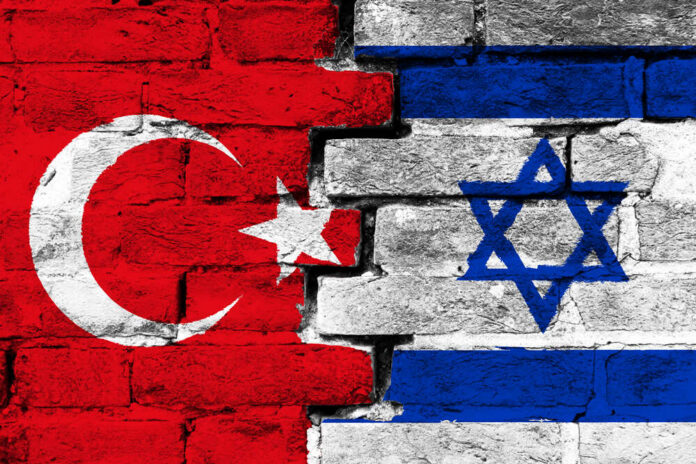 Concept,Of,The,Relationship,Between,Turkey,And,Israel,With,Two Turkey and Israel flags painted on a brick wall