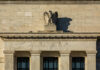 Facade of the Federal Reserve building featuring an eagle sculpture