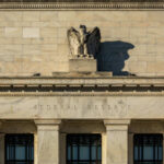 Narrow Vote Pushes Controversial Fed Nominee Facade of the Federal Reserve building featuring an eagle sculpture