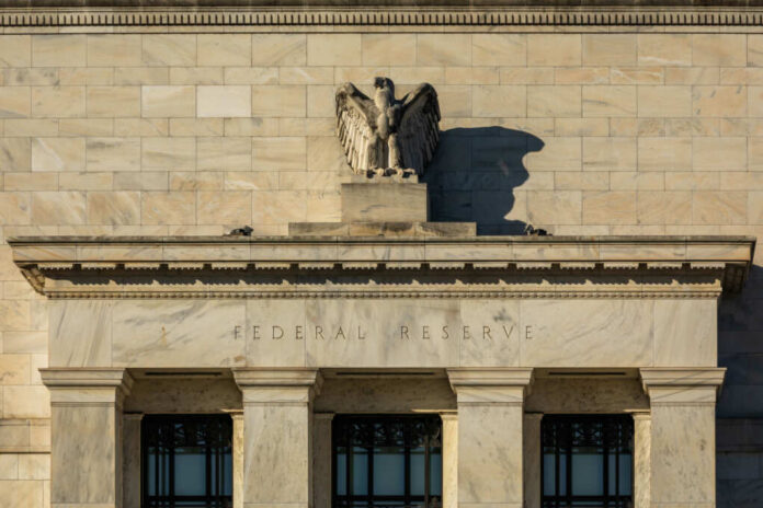 Facade of the Federal Reserve building featuring an eagle sculpture