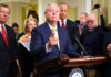 Trump Loyalty Tests Backfire: GOP Faces Turmoil A group of government officials at a press conference with one speaking into a microphone