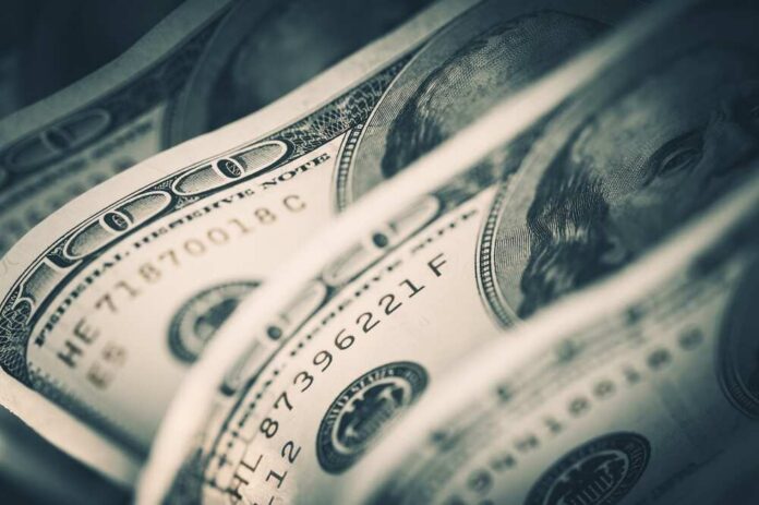 Dollars,Closeup,Concept.,American,Dollars,Cash,Money.,One,Hundred,Dollar Close-up of folded hundred dollar bills
