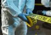 Tennessee Outrage: Grandpa Left Dying Forensic investigators in protective suits setting up crime scene tape