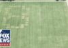 '86 47' VANDALIZED on grass at National Mall