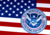 U.S. Immigration and Customs Enforcement badge on an American flag background
