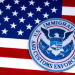 U.S. Immigration and Customs Enforcement badge on an American flag background