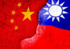 China Test Looms: $14B Deal Dangles A visual representation of the flags of China and Taiwan with a distressed texture