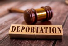 Wooden blocks spelling 'DEPORTATION' next to a gavel