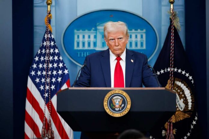 Washington,,January,30,2025:,President,Donald,Trump,Speaks,At A political figure at a podium during a press conference in front of the White House