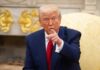 On-Camera Meltdown: Trump Walks Out A man in a blue suit and red tie pointing while seated