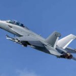 Bombers Launch From Israel? What’s Washington Hiding Twin-engine fighter jet climbing in a clear blue sky