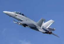 Bombers Launch From Israel? What’s Washington Hiding Twin-engine fighter jet climbing in a clear blue sky