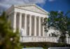 Historic Test Trips Up New Gun Crackdowns The Supreme Court building with columns and a statue in front