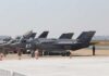Neutral Airspace Showdown Sparks Years Of Blowback F-35 military jets parked on an airfield with crew members nearby