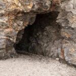 Congo Chaos Threatens Trump’s Minerals Play rocky cave entrance in a cliff