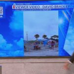 Waterspout moves onshore at Folly Beach