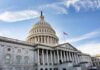 United States Capitol building under a blue sky