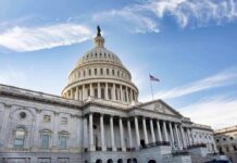 United States Capitol building under a blue sky