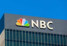 NBC logo on a modern office building facade