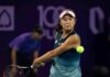 tennis player hitting a backhand shot