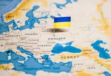 Ukraine flag pin on a map of Eastern Europe