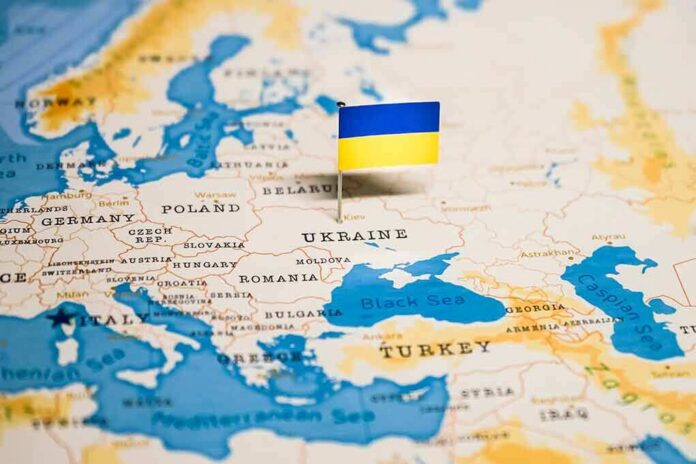 Ukraine flag pin on a map of Eastern Europe