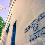 Federal Power Play Targets Voter Rolls Department of Justice building facade with American flag