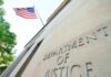 Noncitizen Registration Sparks DOJ Crackdown Department of Justice building with American flag