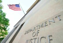 Department of Justice building with American flag