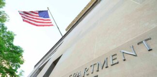 Department of Justice building with American flag
