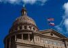 Texas State Capitol dome with U.S. and Texas flags