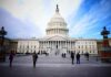 United States Capitol building with visitors on the plaza
