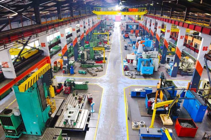 shutterstock_75131428 Aerial view of a large industrial workshop filled with various machinery and equipment