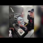 American Airlines Shock: Man Bound Mid-Flight American Airlines passenger restrained with duct tape and handcuffs, plane makes emergency landing