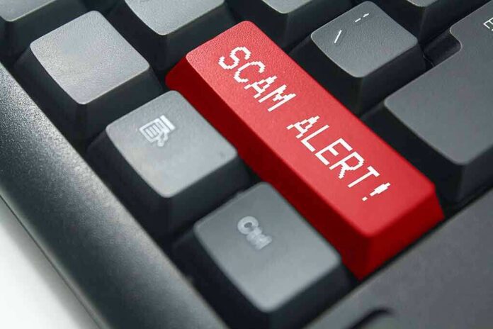 Keyboard with red scam alert key