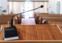 Podium with microphone and Bible in a church