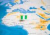 Map of Africa with a pin flag marking Nigeria