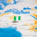 Map of Africa with a pin flag marking Nigeria